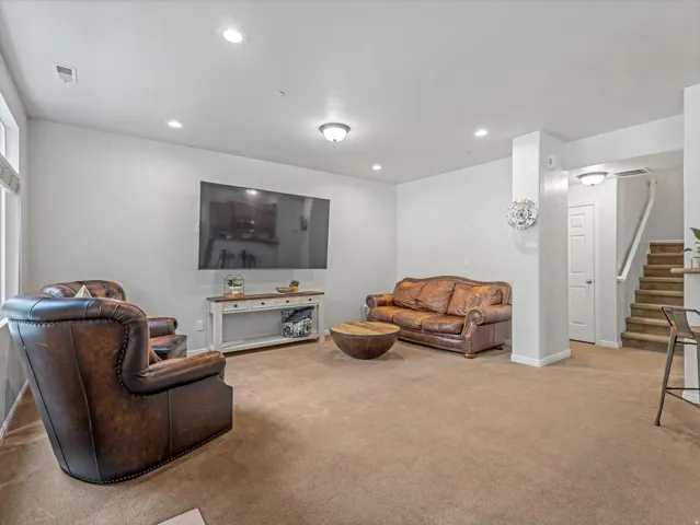 Recessed and flush mount ceiling lighting with light gray wall finishes