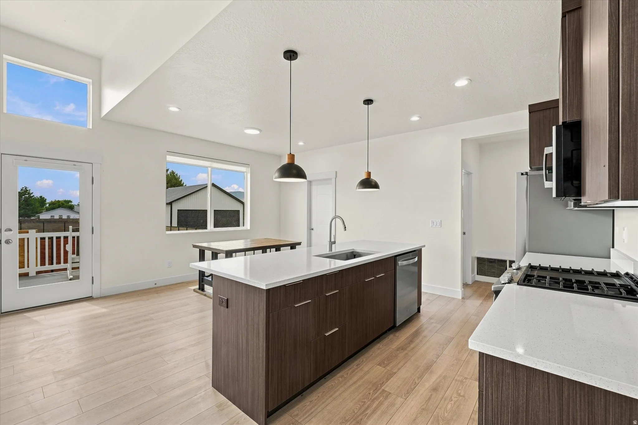 Kitchen overlooking dining area to deck.  Lot's of Natural LIght!