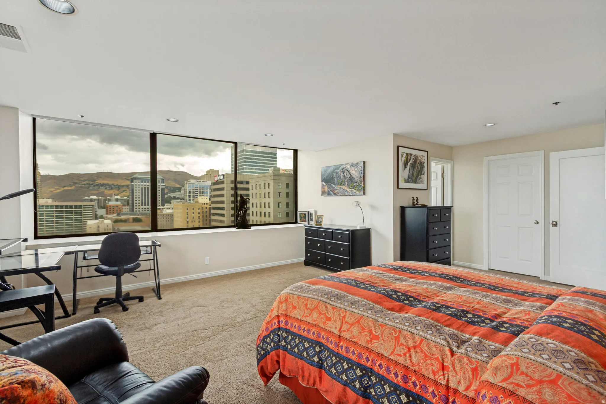 Primary bedroom has walk in closet and looks north and west with excellent views