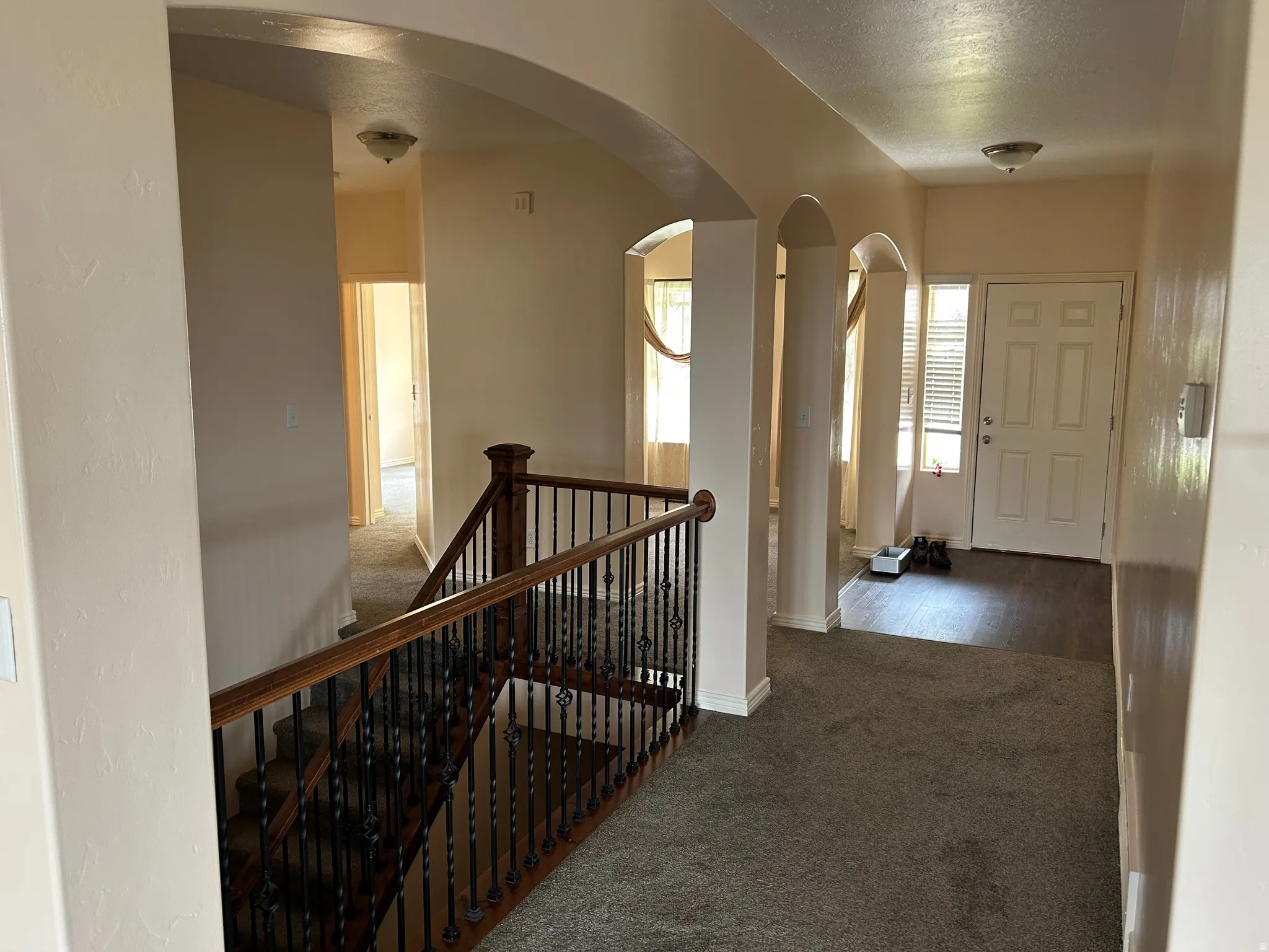 Arched doorways define architectural transitions