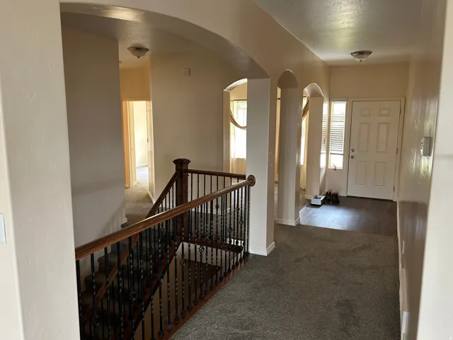Arched doorways define architectural transitions