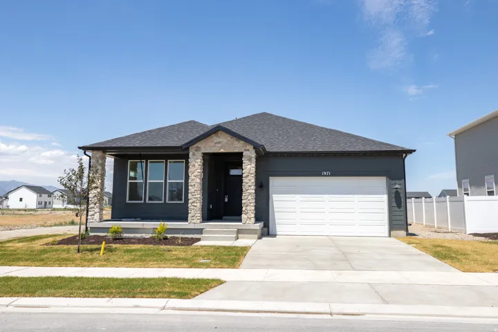Granite Elevation B with extended porch and front yard landscaping included.