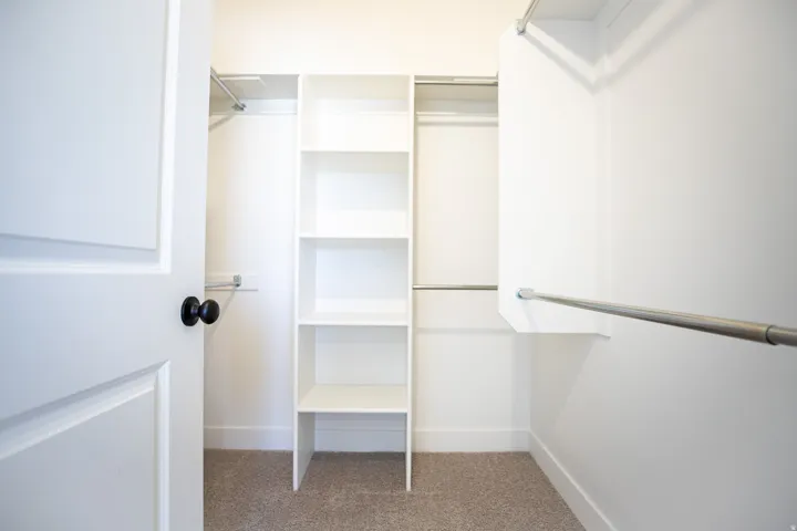 Large walk-in closet as part of primary suite.