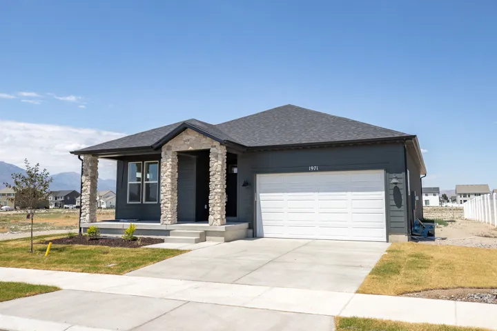 Granite Elevation A with extended porch and open space to rear and city park to the left to be installed.