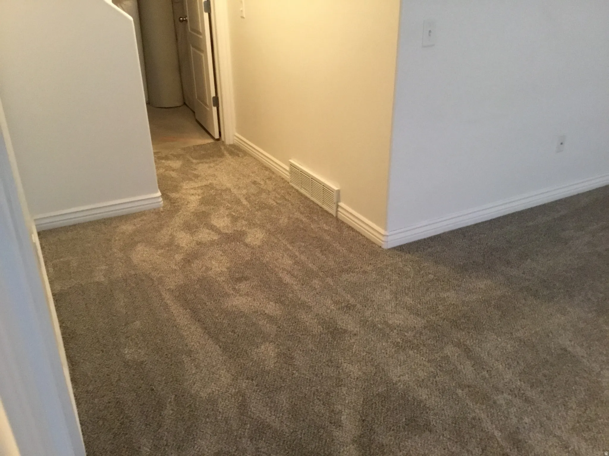 Plush grey carpeting throughout