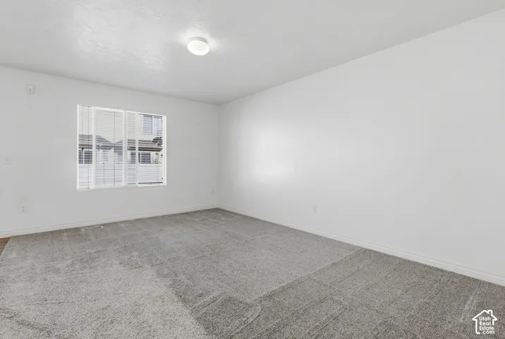 Gray carpeting and white walls
