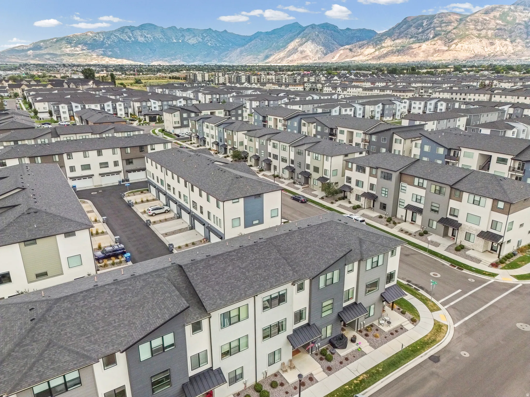 Modern townhome community featuring diverse architectural styles and multiple levels