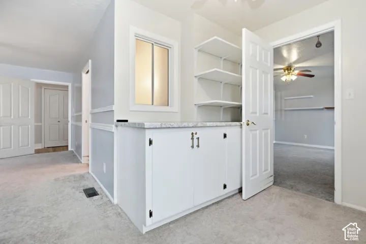 Bedroom with a large walk around closet/storage area