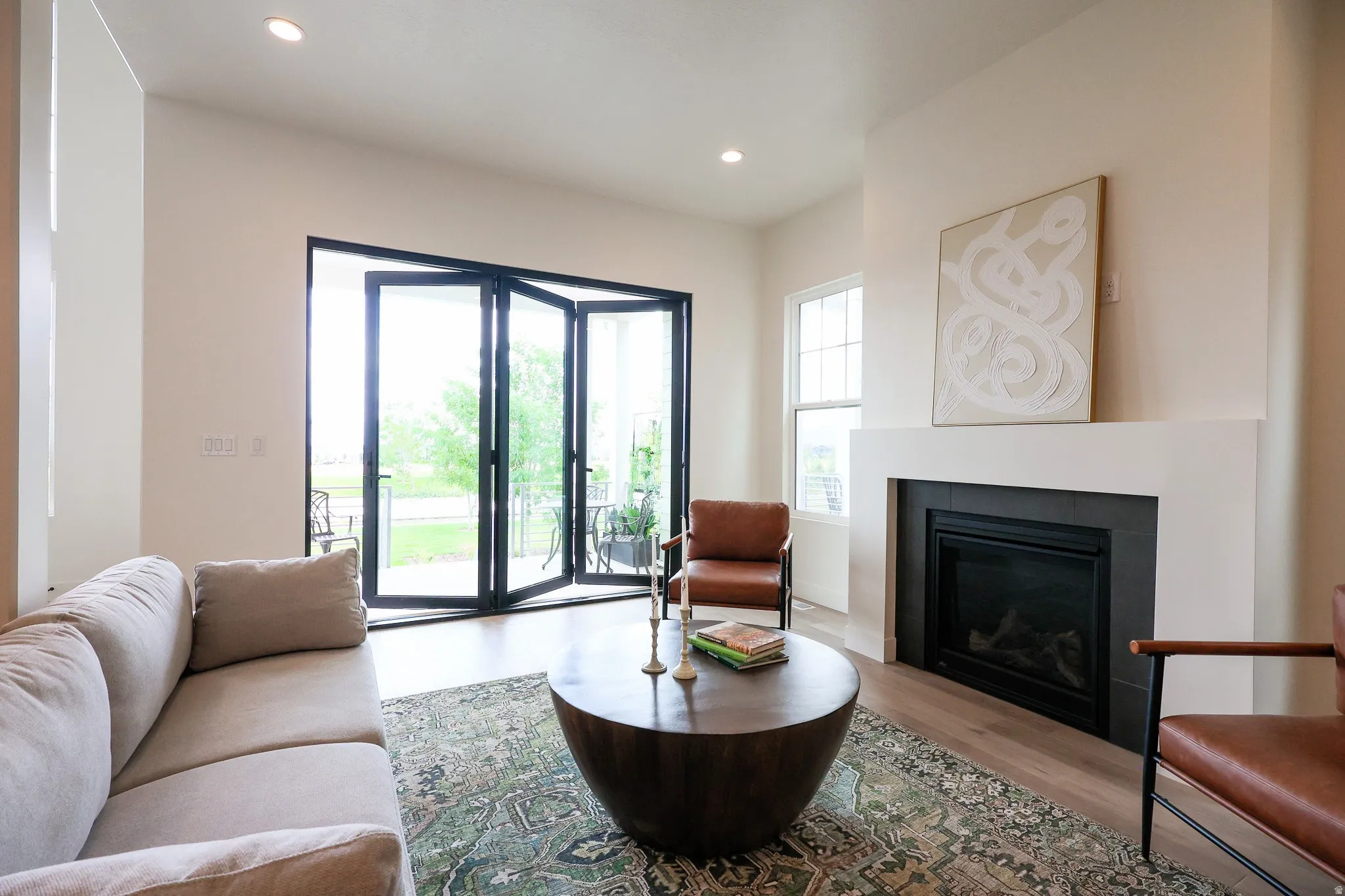 Folding patio doors with black frames