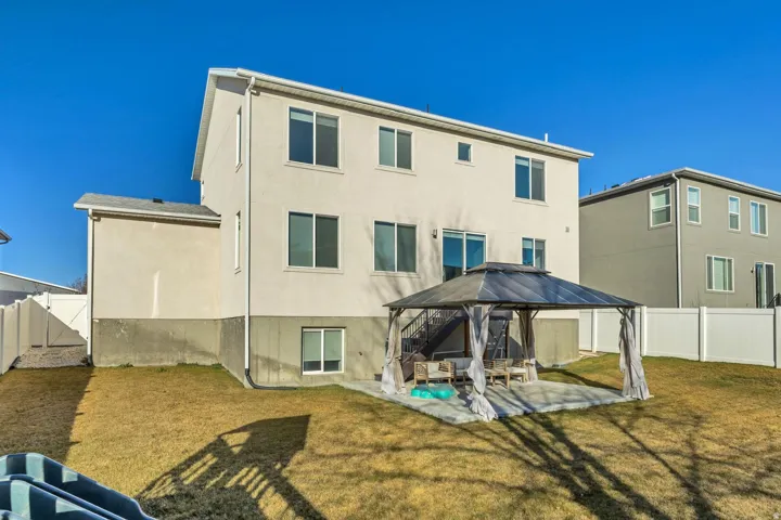 Multi-story stucco exterior with multiple windows
