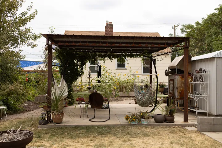 Outdoor patio with a metal pergola structure