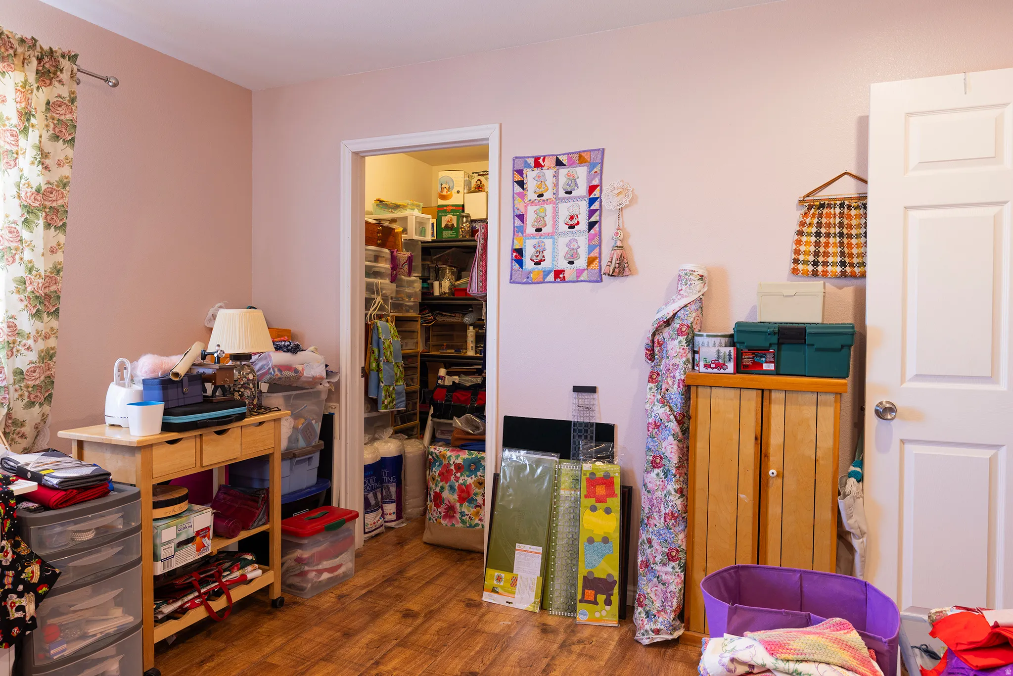Wood-finish flooring with a light-colored wall paint