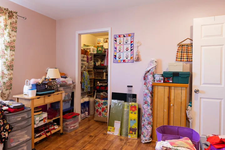 Wood-finish flooring with a light-colored wall paint