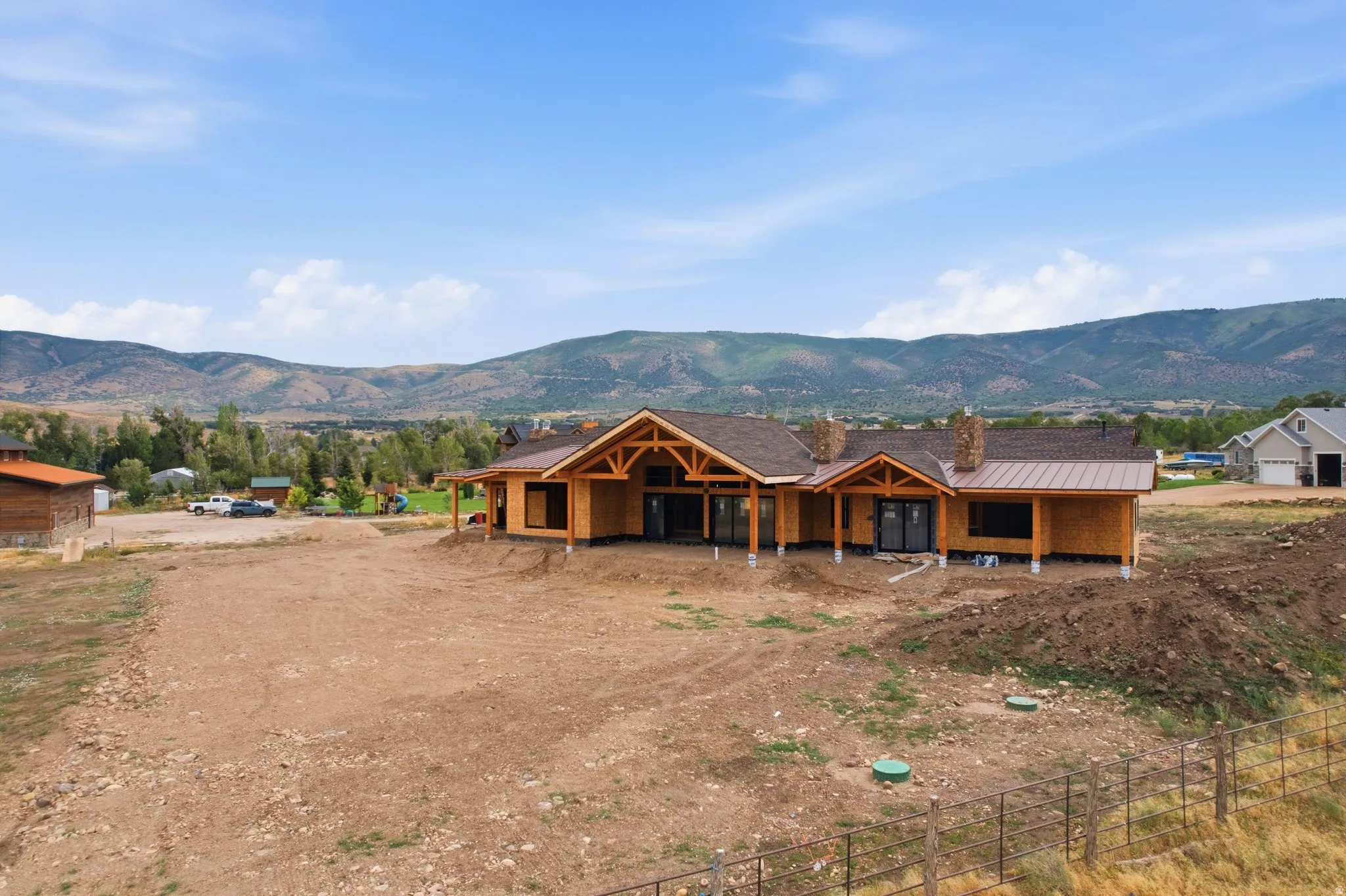 Looking northeast at the west (back) of the home