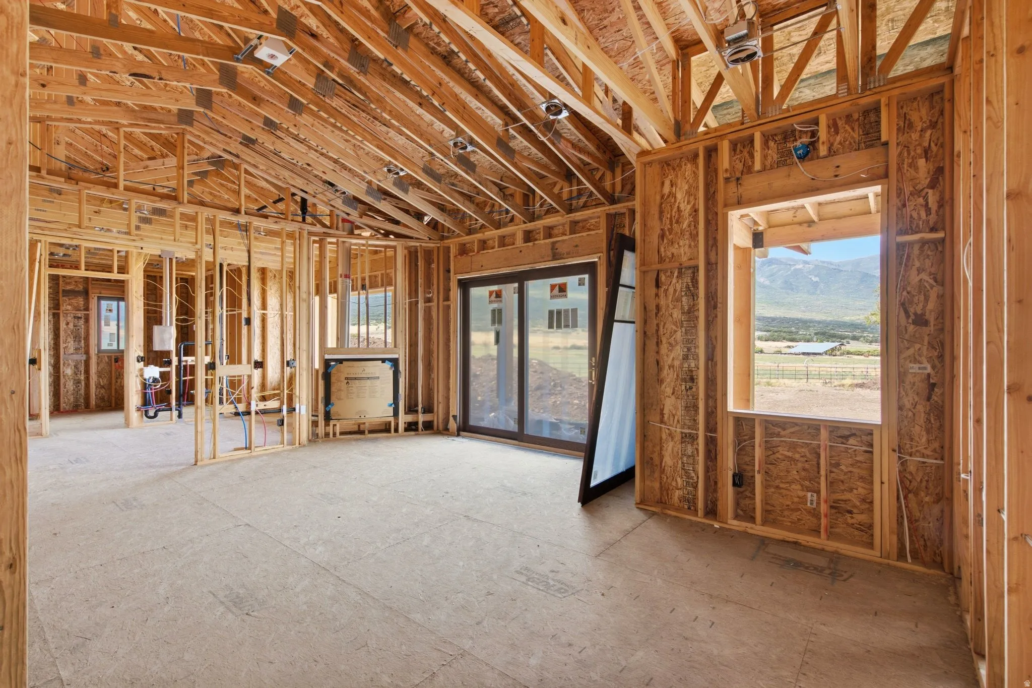 Primary bedroom with a lot of windows and natural lighting