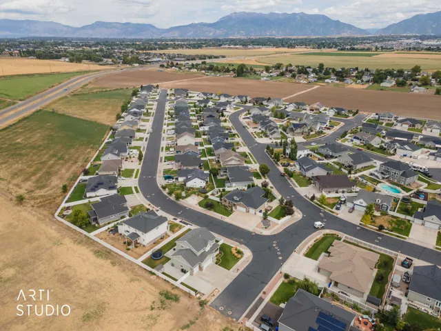 Residential development with mountain backdrop and established roadways