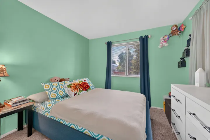 Bright interior with a window and light-colored walls