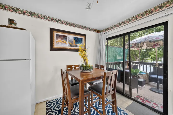 Sliding glass doors opening to an outdoor deck