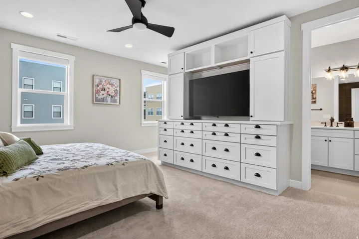 Built-in media center with extensive drawer storage and display shelving