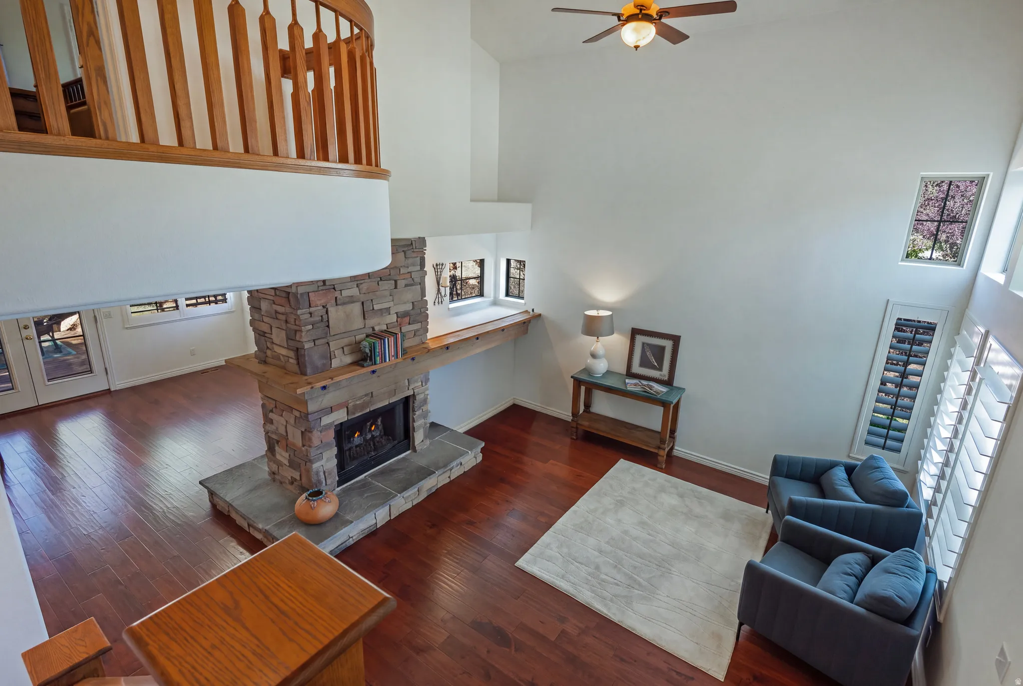Looking Down on the Living Room and the Two-Sided Fireplace to the Family Room