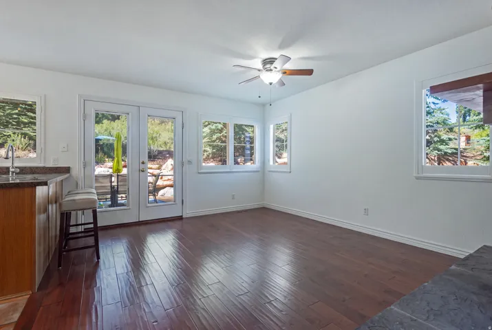 Family Room to the Kitchen & Back Deck Outside