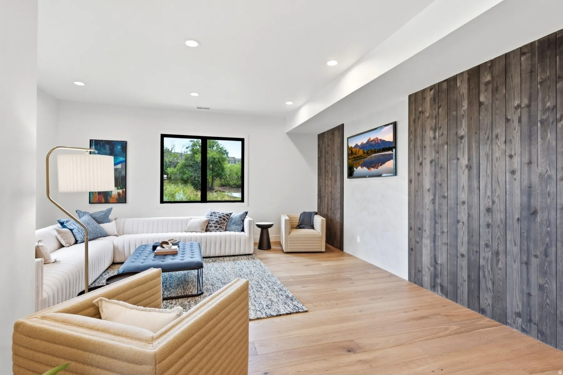 Recessed lighting illuminating the expansive living space