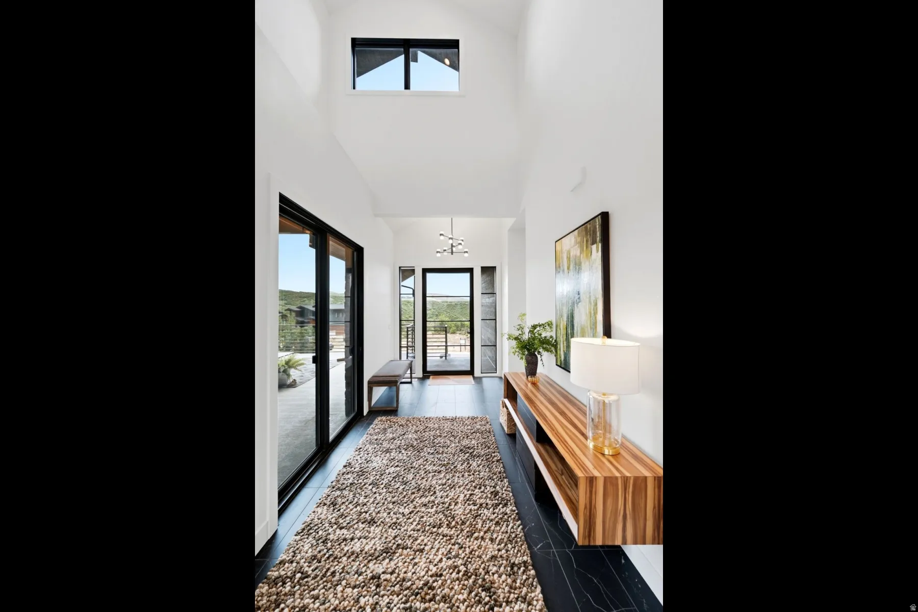 Vaulted ceiling with an upper transom window