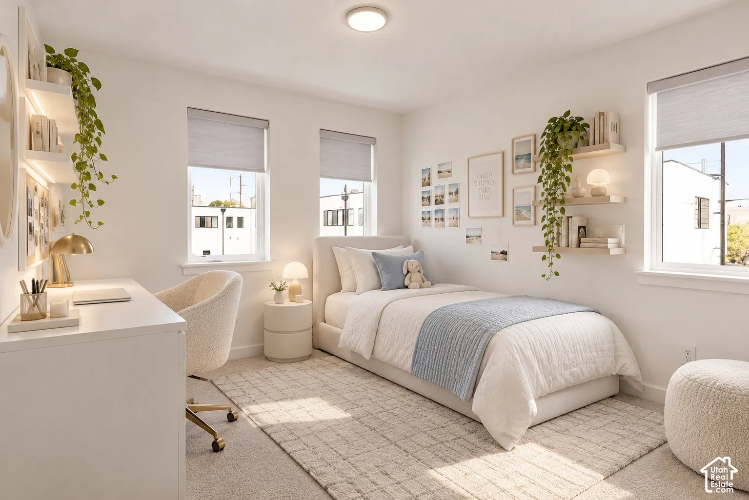 Neutral-toned room featuring neutral carpeting, three double-hung windows with integrated roller shades, and multiple built-in floating wall shelves