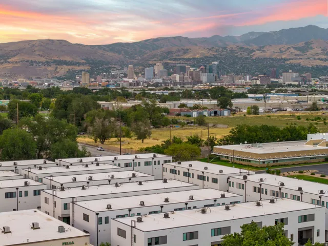 Mountain backdrop with a city skyline
