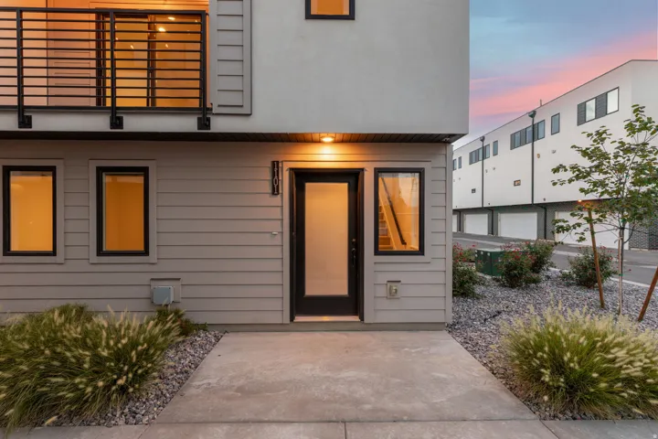 Modern facade featuring horizontal siding and smooth stucco