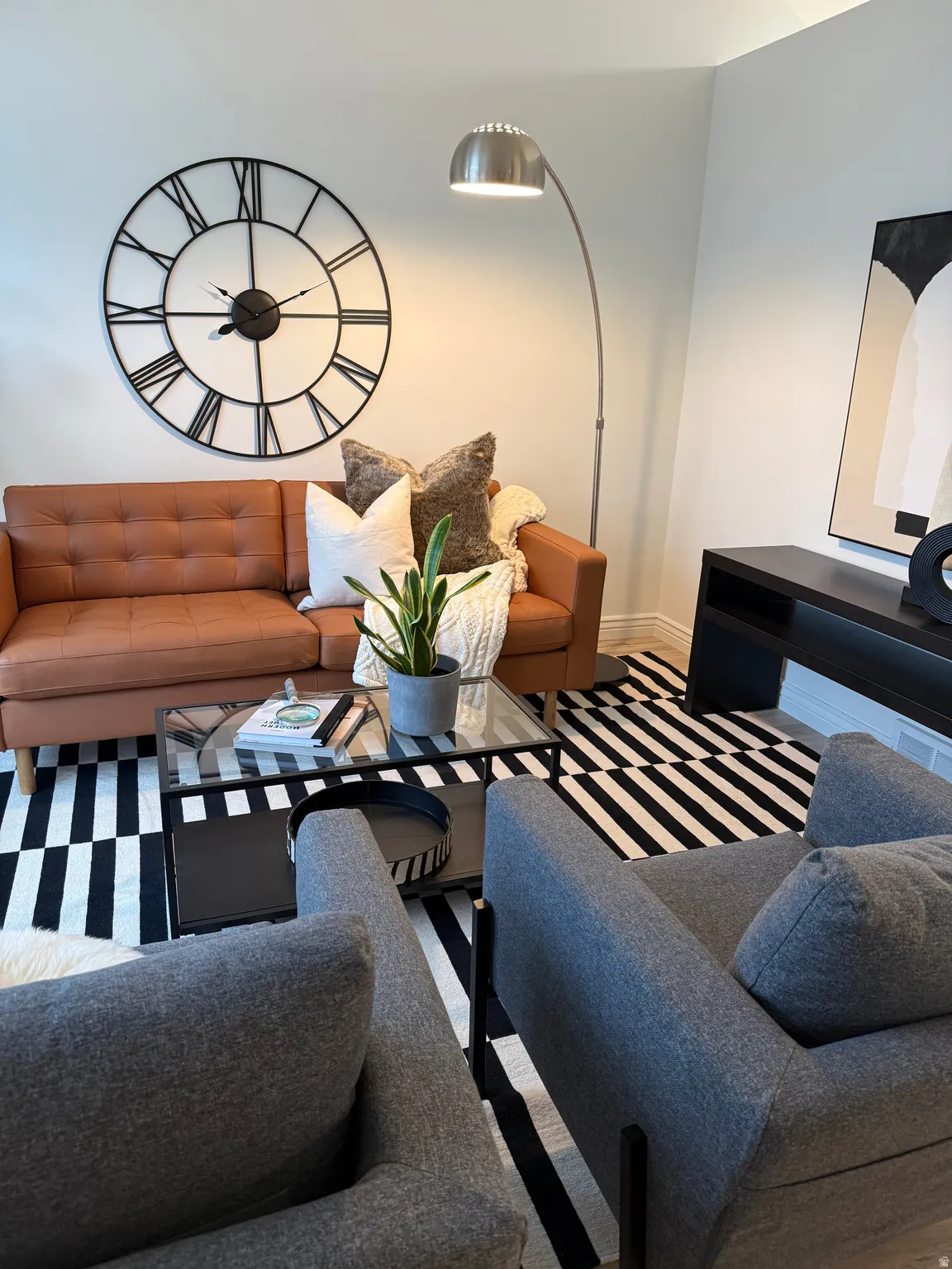 Recessed ceiling lighting illuminates the living space