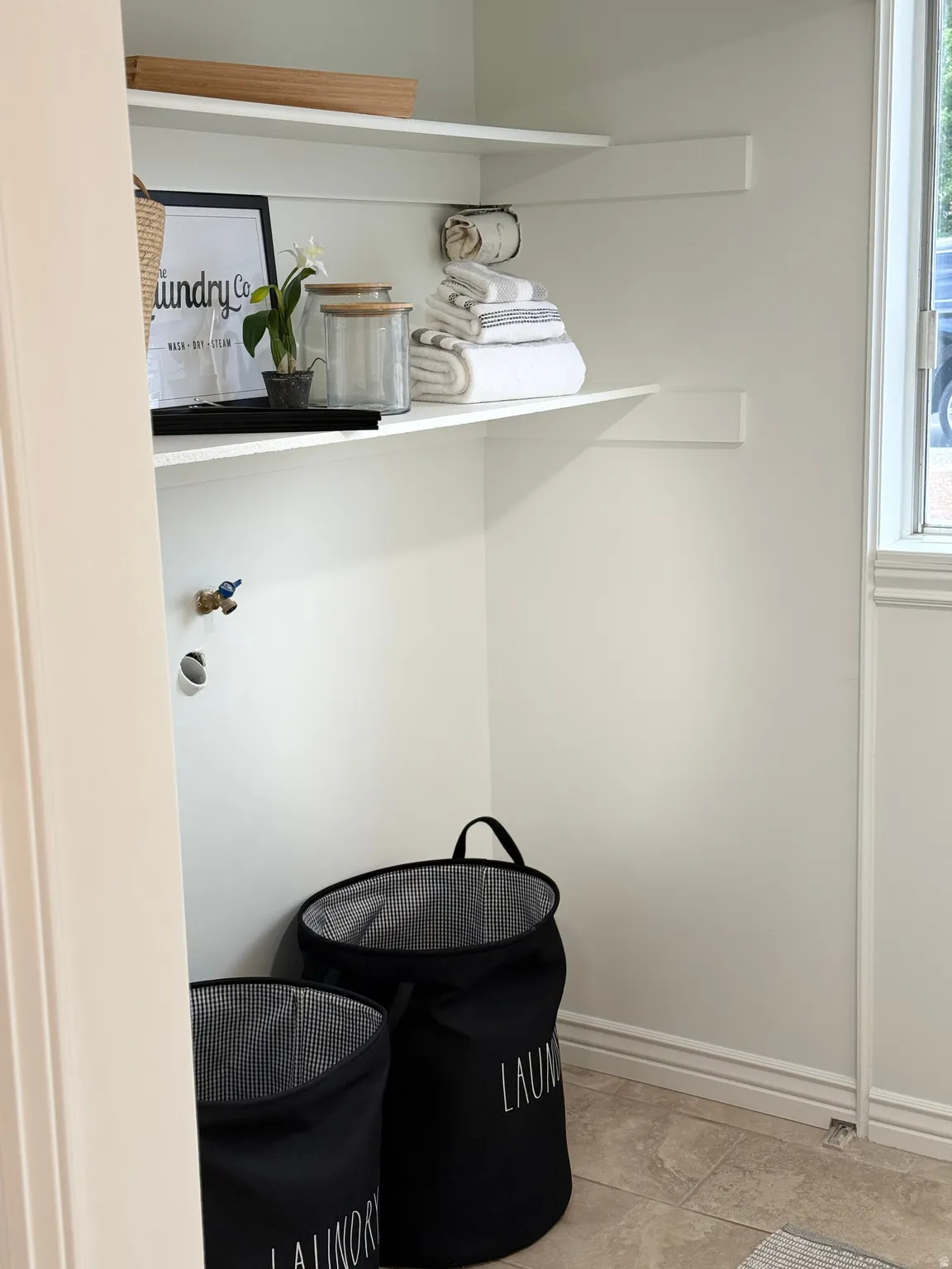 Integrated shelving, utility connections, and a single window