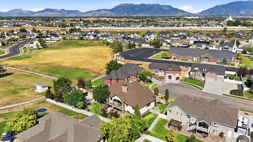 Expansive mountain backdrop with established residential areas