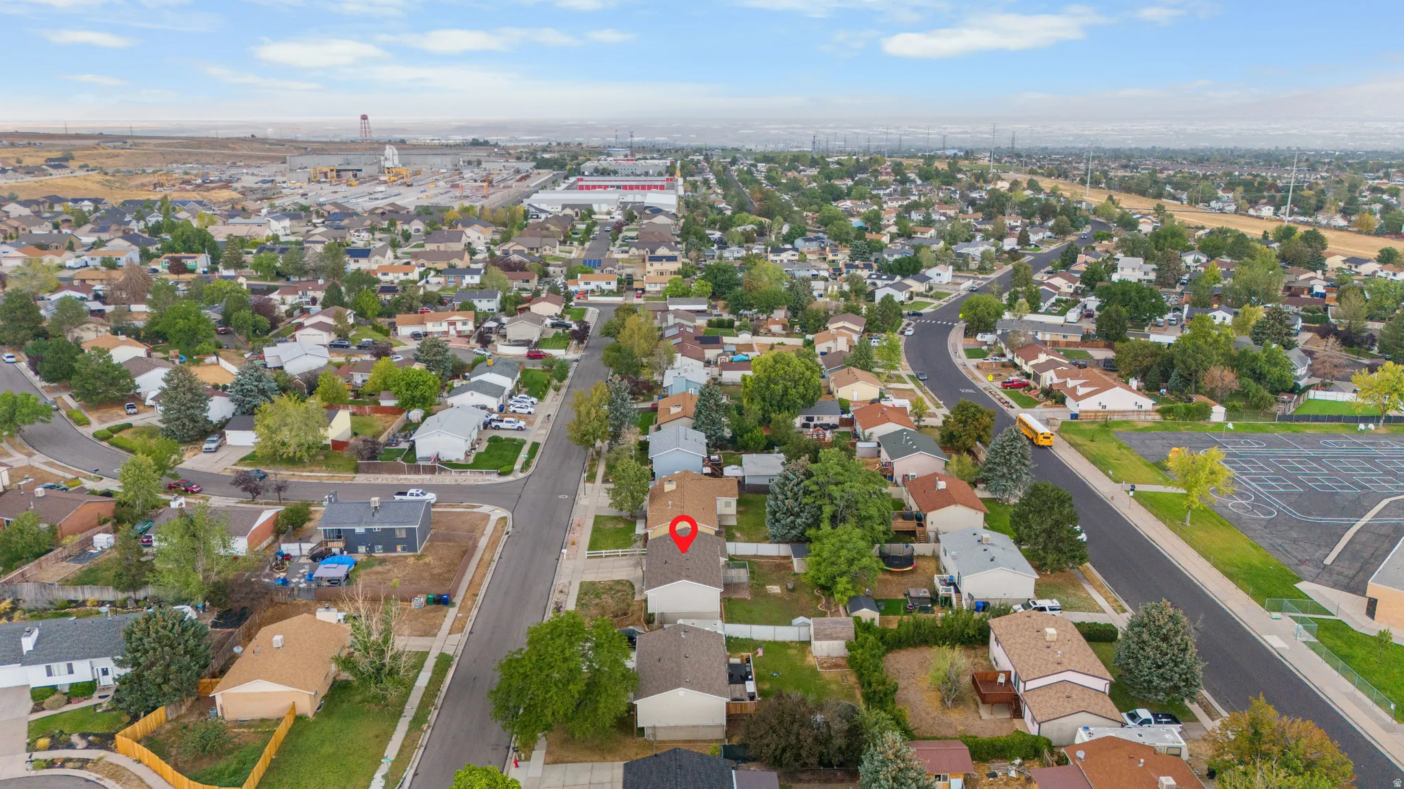 Aerial perspective showcasing the residential neighborhood with a street grid pattern