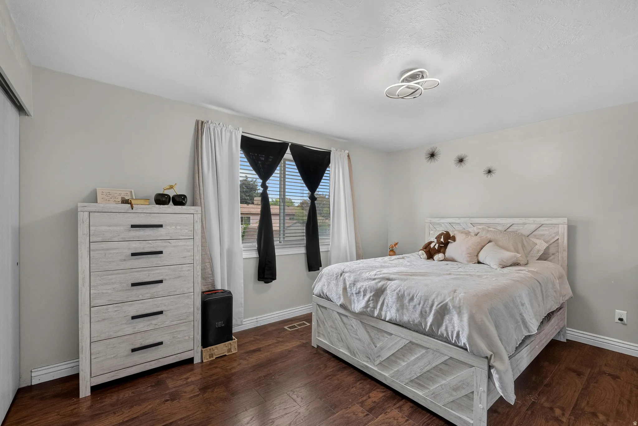 Wood-finish flooring throughout