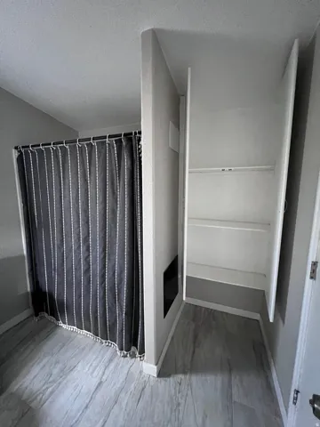 Wood-finish flooring with a light gray tone