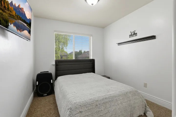 White walls and ceiling paired with recessed lighting
