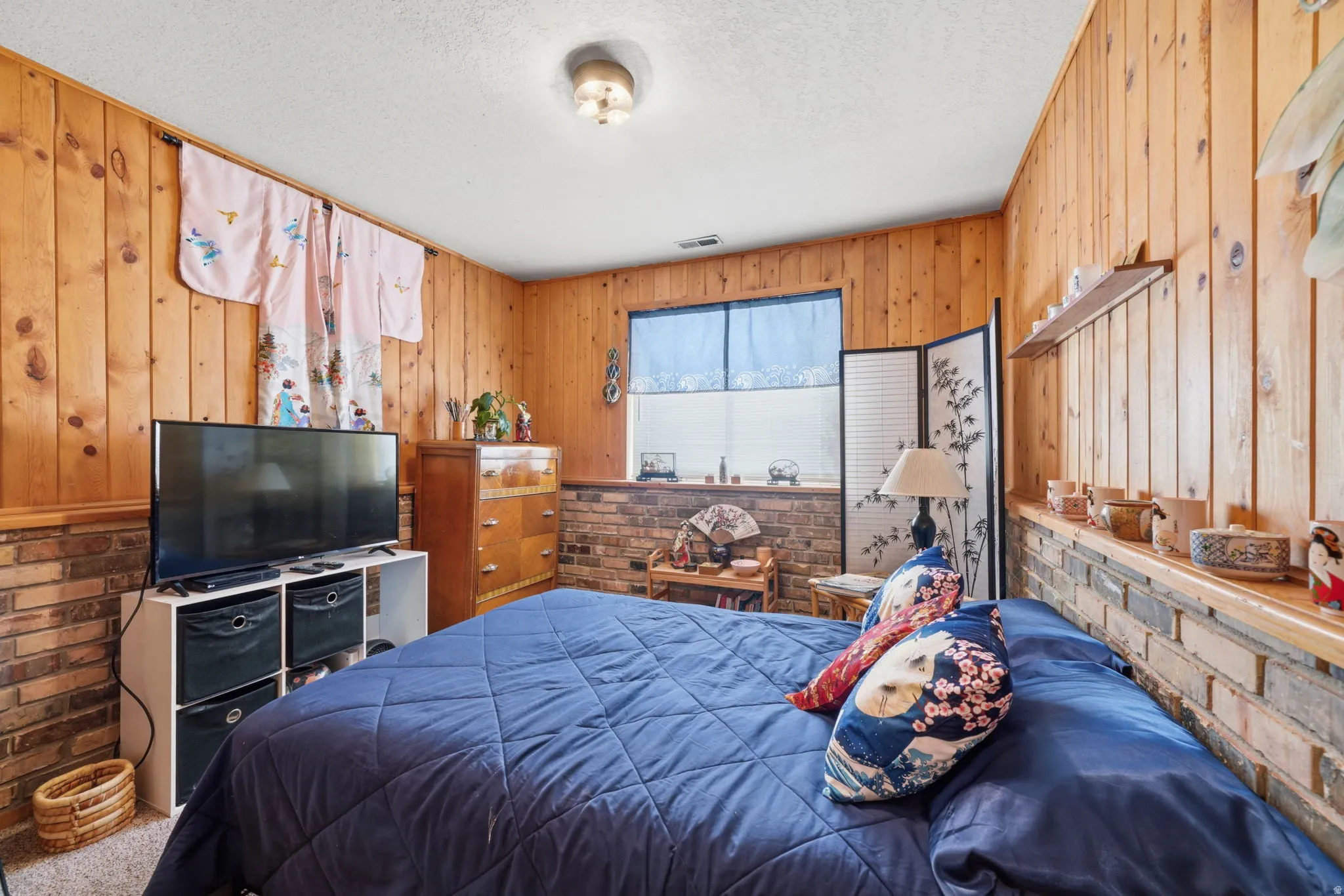 Wood paneling and exposed brick accents