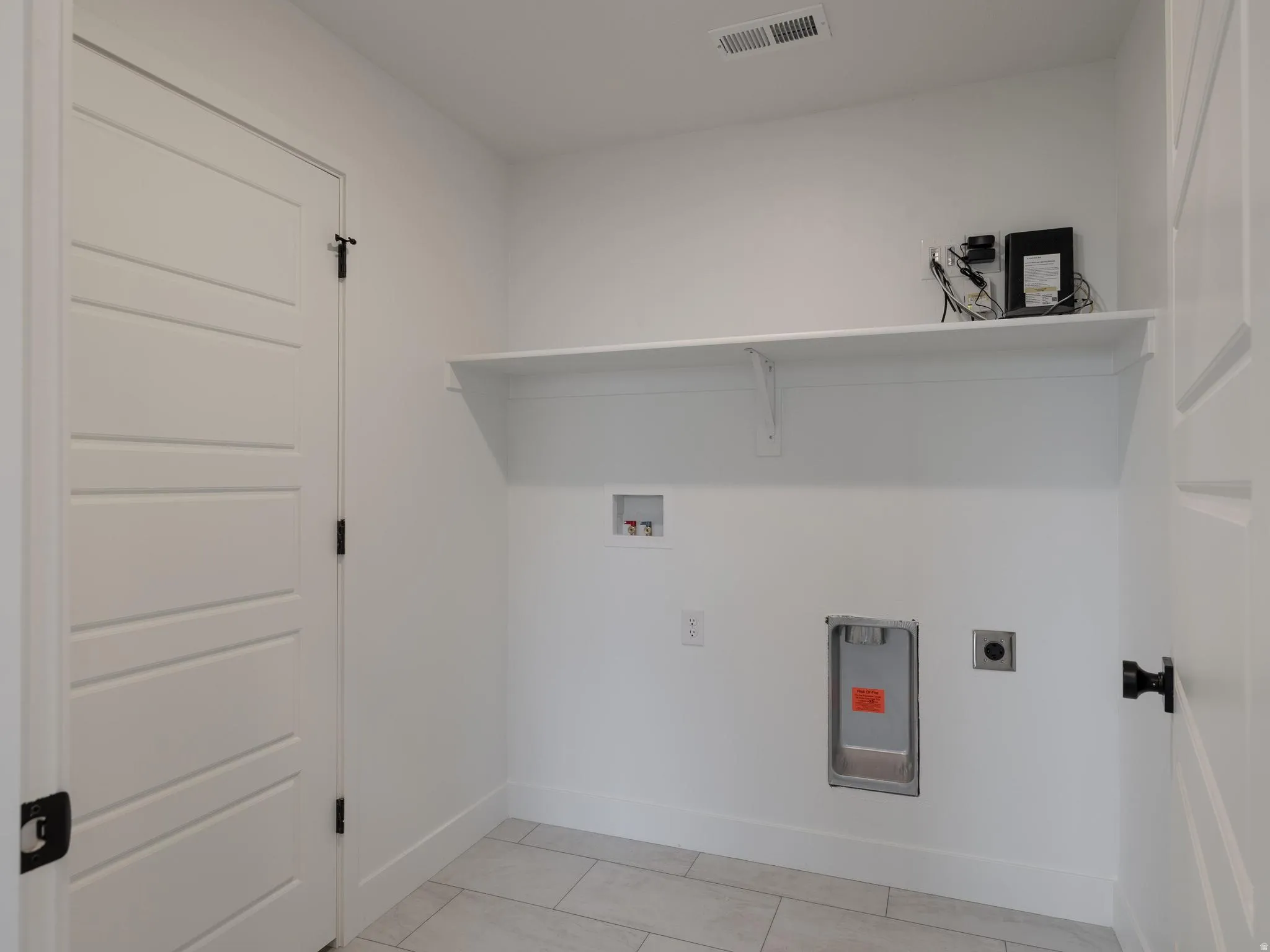 White panel door with matte black hardware