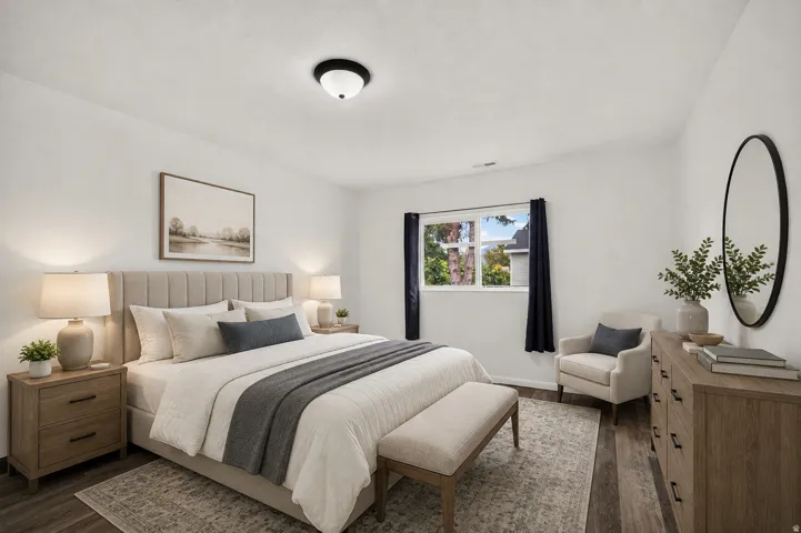 Virtually Staged - Wood-finish flooring with white walls and a contemporary flush-mount ceiling light