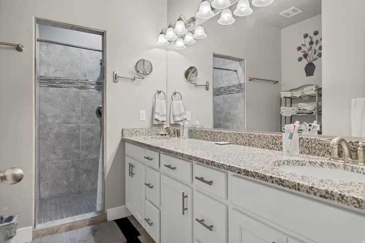 Dual vanity with granite-style countertop