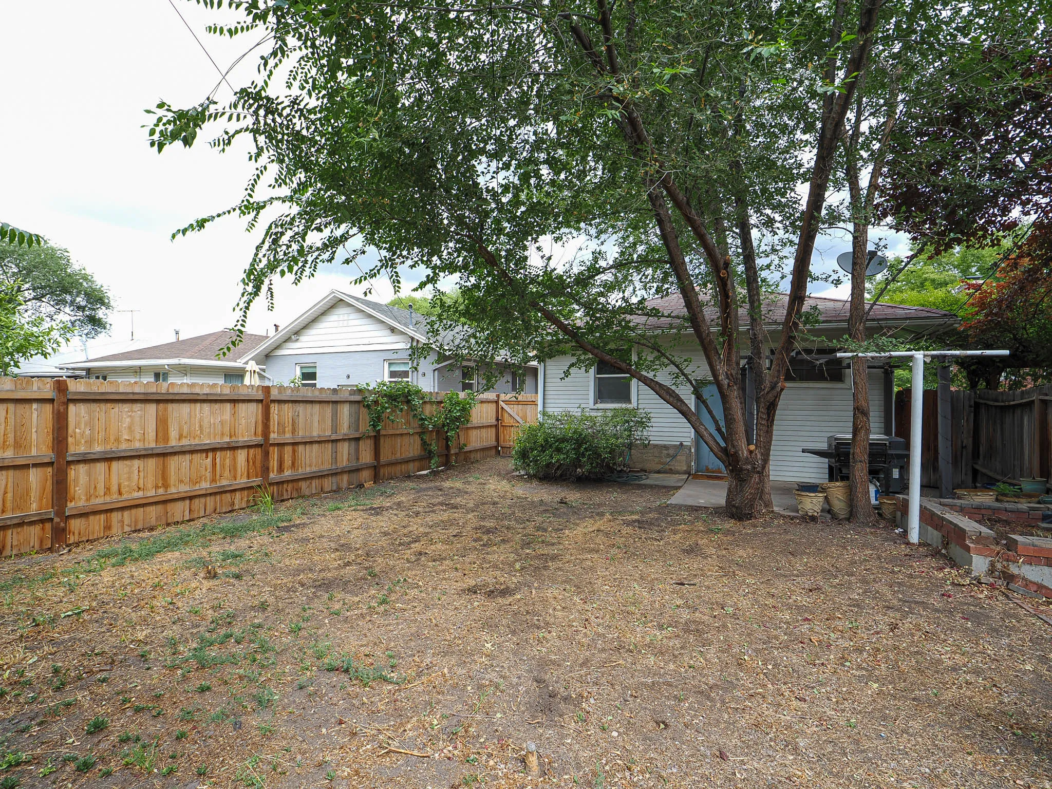 Private backyard with loads of potential