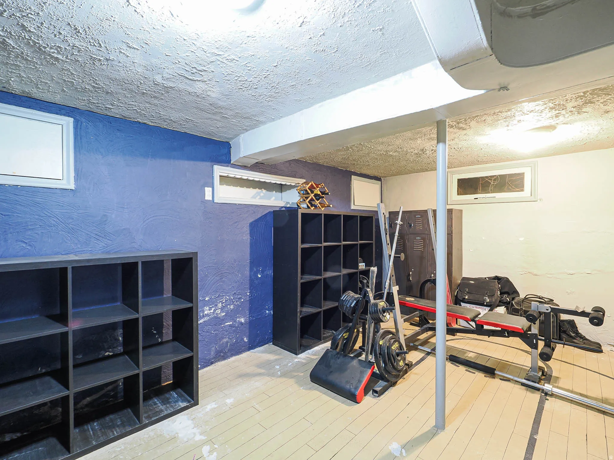 Spacious basement flex room, painted concrete flooring,