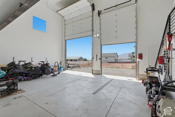 Garage Enthusiast's dream! This massive, versatile garage offers room for multiple cars, boats, RV's, trailers and outdoor toys