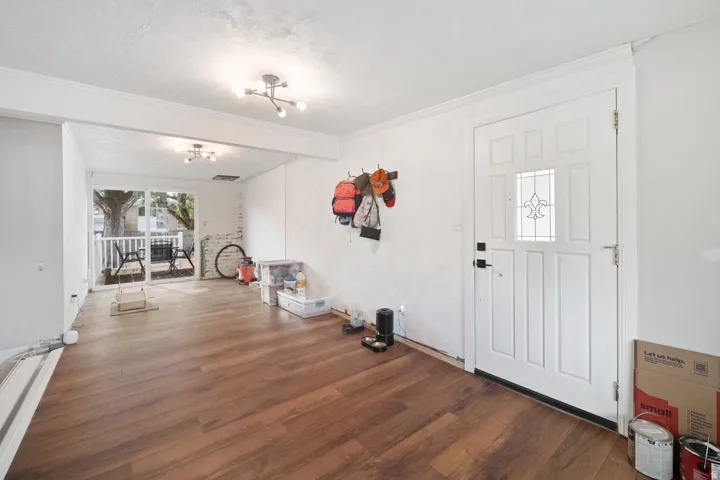 Wood-finish flooring throughout the space