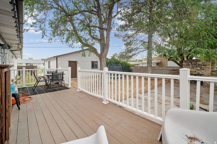 Composite wood-finish decking with white railing