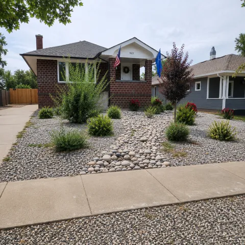 Brick exterior with a covered front entry