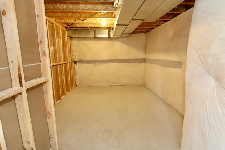 This room could be used for gym, theater room or other flex space