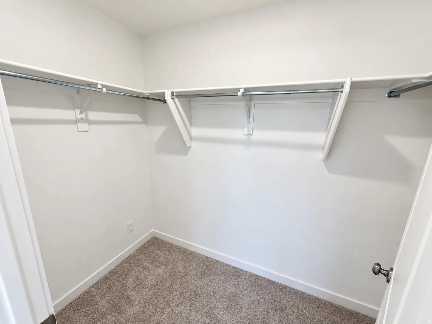Built-in shelving with hanging rods