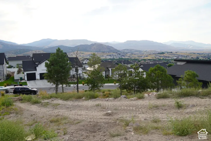 Expansive undeveloped lot with a mountainous backdrop